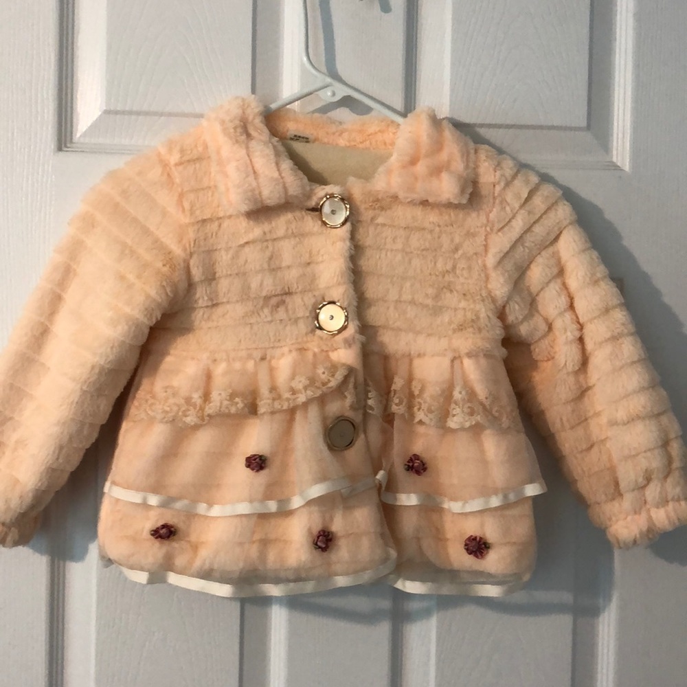 Beautiful size 2T  peach colored coat